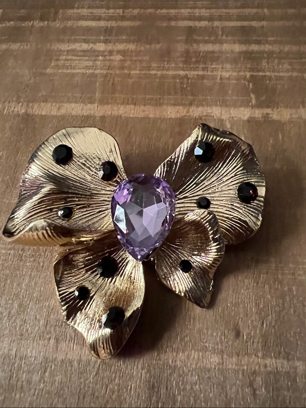 3/$18 Gold-Tone Floral Brooch with Purple Crystal Center Lot 6079